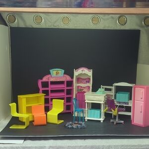 collection of Mattel Barbie dollhouse furniture and accessories